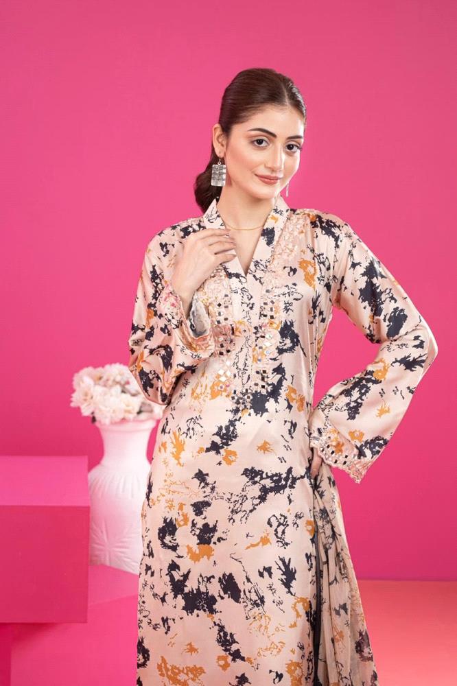 Indulge in luxury with our exquisite Silk Stitched Collection, featuring finely crafted garments that blend elegance with comfort. This collection includes a branded fine quality SILK shirt adorned with intricate mirror work embroidery, a SHAMOOZ silk trouser with cut work mirror detailing, and a silk dupatta with a four-sided silk border, all expertly stitched for a perfect fit.

Branded Fine Quality SILK Shirt with Embroidered Mirror Work
High-Quality SHAMOOZ Silk Trouser with Cut Work Mirror Detailing
Silk Dupatta with 4-Sided Silk Border
Fine Quality Stitching for a Perfect Fit
Available Sizes: Small, Medium, Large

Price:
PKR 4700/-

Elevate your wardrobe with this luxurious Silk Stitched Collection that combines style and sophistication. Each piece is designed to make a statement, ensuring you stand out on any occasion. Embrace the charm of silk, the allure of mirror work, and the comfort of high-quality craftsmanship. Order now and experience the epitome of fashion and finesse.

Limited stock available. Act fast to make this exquisite Silk Stitched Collection yours!

NOTE: Please note that the actual color of the products may slightly vary from the images displayed on our website. This can be attributed to lighting conditions, individual monitor settings, and the inherent nature of fabric dyes.