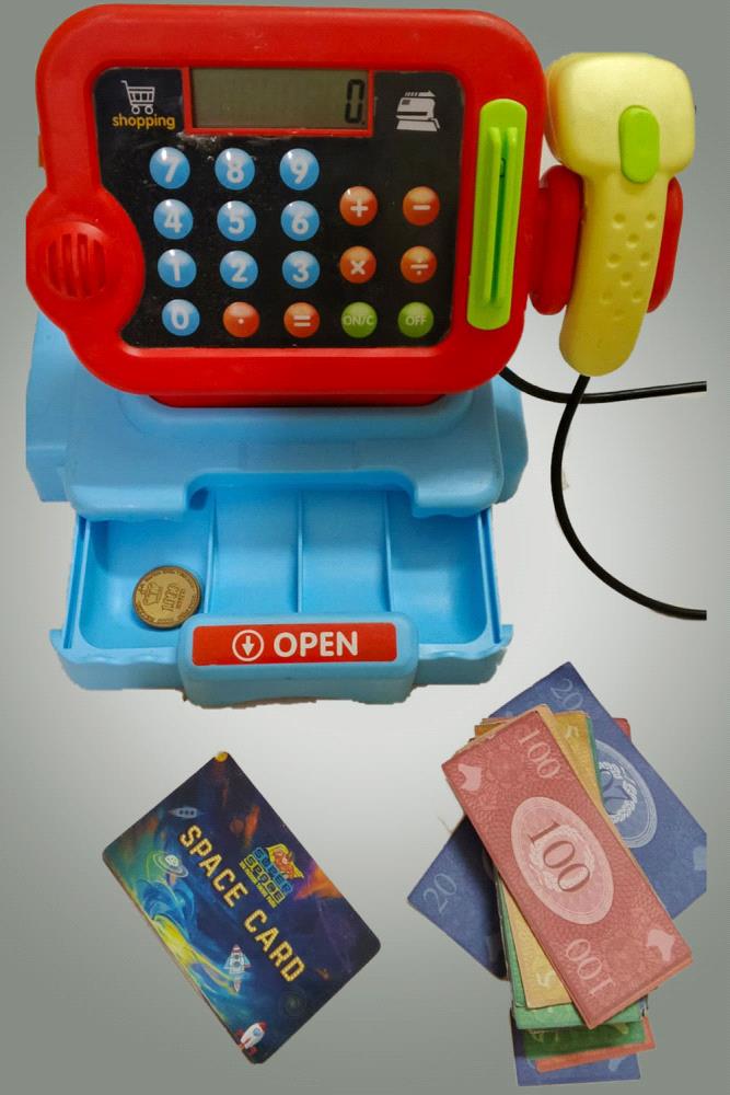Let your child enjoy hours of imaginative play with this realistic electronic cash register toy. This set includes a red and blue cash register with a working calculator and a drawer that opens for play money. It also comes with pretend play money, a credit card, and a scanner, providing everything needed for a fun shopping experience. This toy is perfect for role-playing games, helping children develop social skills, basic math concepts, and imaginative storytelling. It is an engaging activity that encourages interactive play.

Disclaimer: Please note that actual product colors and size may vary slightly due to lighting and screen settings.

Price: PKR 850/-