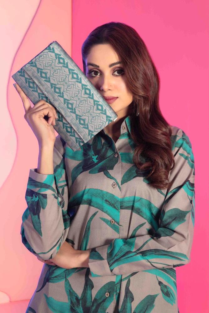 Upgrade your wardrobe with the stunning Luna Pret by Tawakkal Fabrics. This elegant 2-piece collection features a beautifully stitched digital printed lawn shirt, paired with matching digital printed lawn trousers. A complimentary clutch completes the look, making it perfect for any occasion.

Key Features:

Tawakkal Fabrics Luna Pret Eid Collection
2-piece set: Digital printed stitched lawn shirt & digital printed stitched lawn trouser
Includes a complimentary clutch
High-quality lawn fabric

Sizes: Small, Medium & Large

Price: PKR 3600/-

Note: Due to photographic lighting or your device settings, the products actual color may vary slightly.