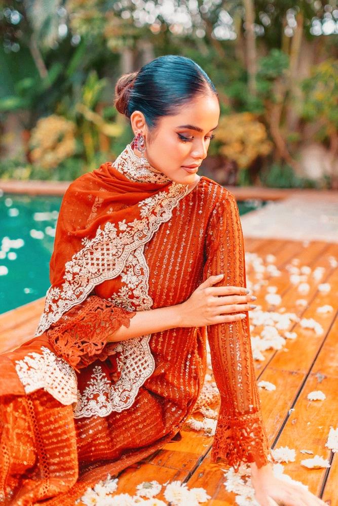 Elevate your style with this stunning Pakistani ready-to-wear ensemble, featuring intricate sequin kari and cutwork embroidery on a luxurious chiffon shirt and dupatta. The matching raw silk pants complete the sophisticated look. Perfect for weddings, formal events, or special occasions.

Details:

Fabric: Premium Chiffon Shirt and Dupatta, Raw Silk Pants
Embroidery: Hand-stitched Sequin Kari and Delicate Cutwork Designs
Shirt Length: 41 inches approximately
Dupatta Length: 2.75 yards approximately
Available Sizes: Small, Medium, Large

Price: PKR 8000/-

Vibrant Jewel Tones: The set features a rich blend of Black, Lavender (Light Purplish), Wine Shade, and Emerald Green perfect for making a bold statement.

NOTE: Discover the allure in every shade! Please note that color variations may occur due to screen resolution, ensuring a unique and personalized touch to your Sequins Kari ensemble