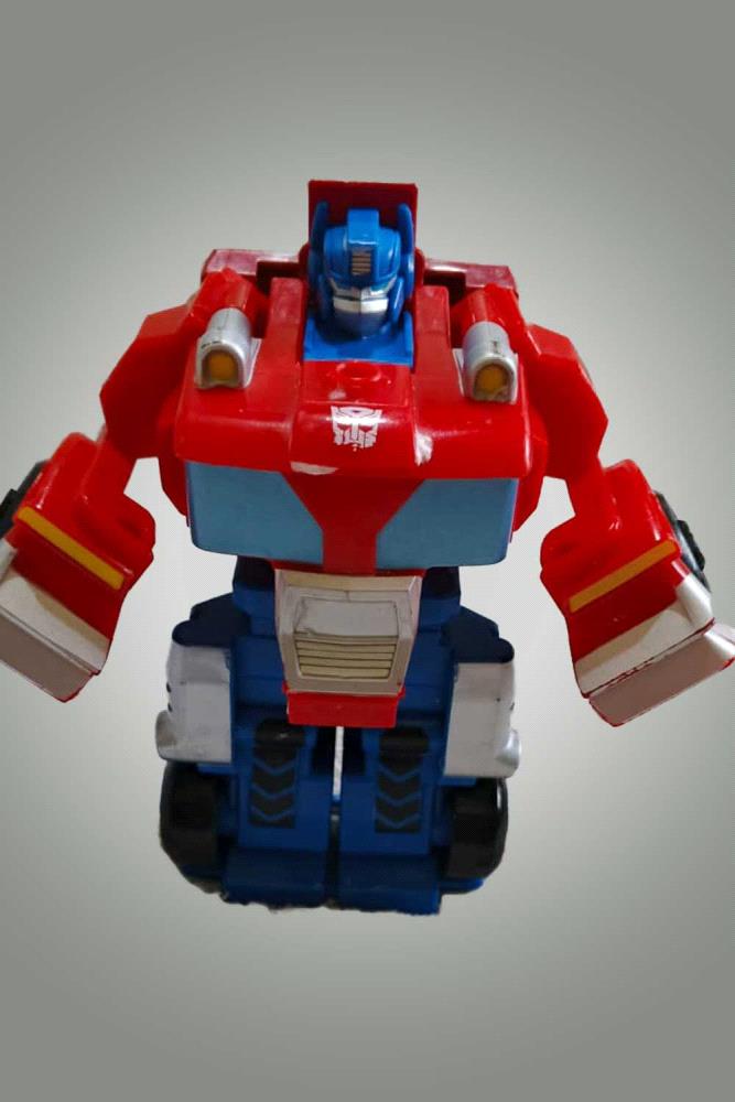 Get ready for exciting adventures with this fun transforming robot toy. This toy converts easily from a sturdy truck to a heroic robot, just like your favorite Autobot leader. 

It features a classic red and blue design, making it instantly recognizable. Perfect for imaginative play, this toy encourages creativity and helps develop fine motor skills as children transform it between its two modes. It is a great addition to any toy collection and provides hours of entertainment for kids who love robots and vehicles.

Please note that there may be slight variations in color and size.

Price: PKR 850