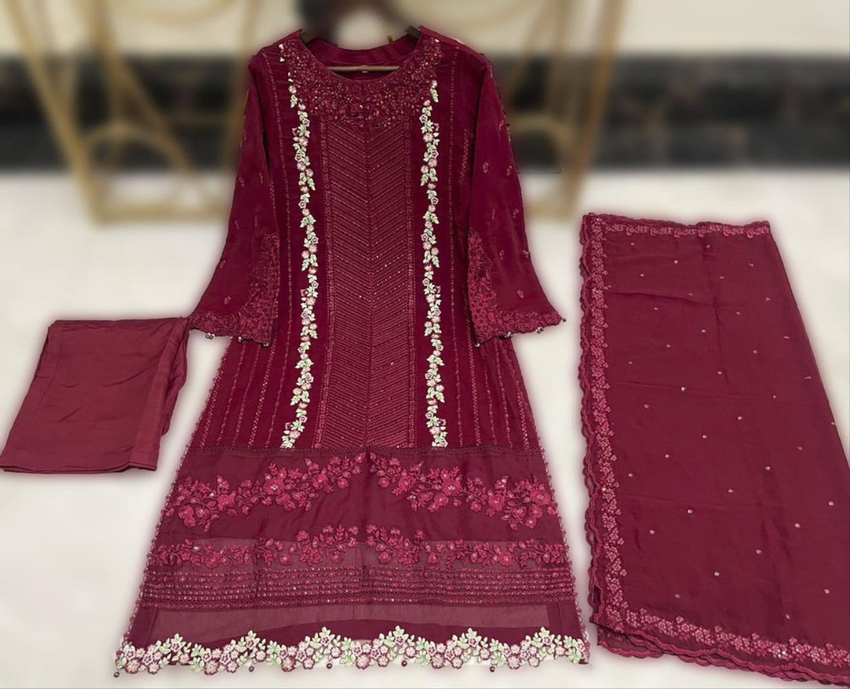 Introducing Ruby Dusk a beautiful three-piece straight shirt from our special Luxury Pret Collection. Made with fine chiffon the set includes a dupatta with elegant sequins embroidery. The front of the shirt is carefully detailed with hand embellishments giving it a unique artistic feel.

Sizes: Small Medium Large and X-Large

Disclaimer:
Please keep in mind that the color of the product may appear slightly different in person due to lighting and screen variations.