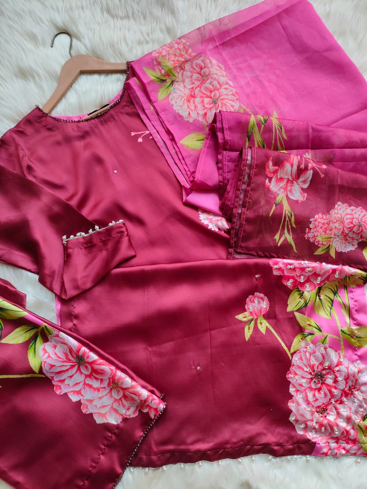 Step into timeless elegance with this latest Silk Hand Embellished 3-Piece Collection. Intricate handwork on premium silk, designed to make you stand out on any occasion. 

Whether it is a family gathering or a formal evening, the rich detailing and smooth fabric offer unmatched grace and comfort.

Sizes: Small, Medium, Large, and X-Large

Price: PKR 6550/-

Disclaimer:
Actual product color may vary slightly due to lighting and screen settings.